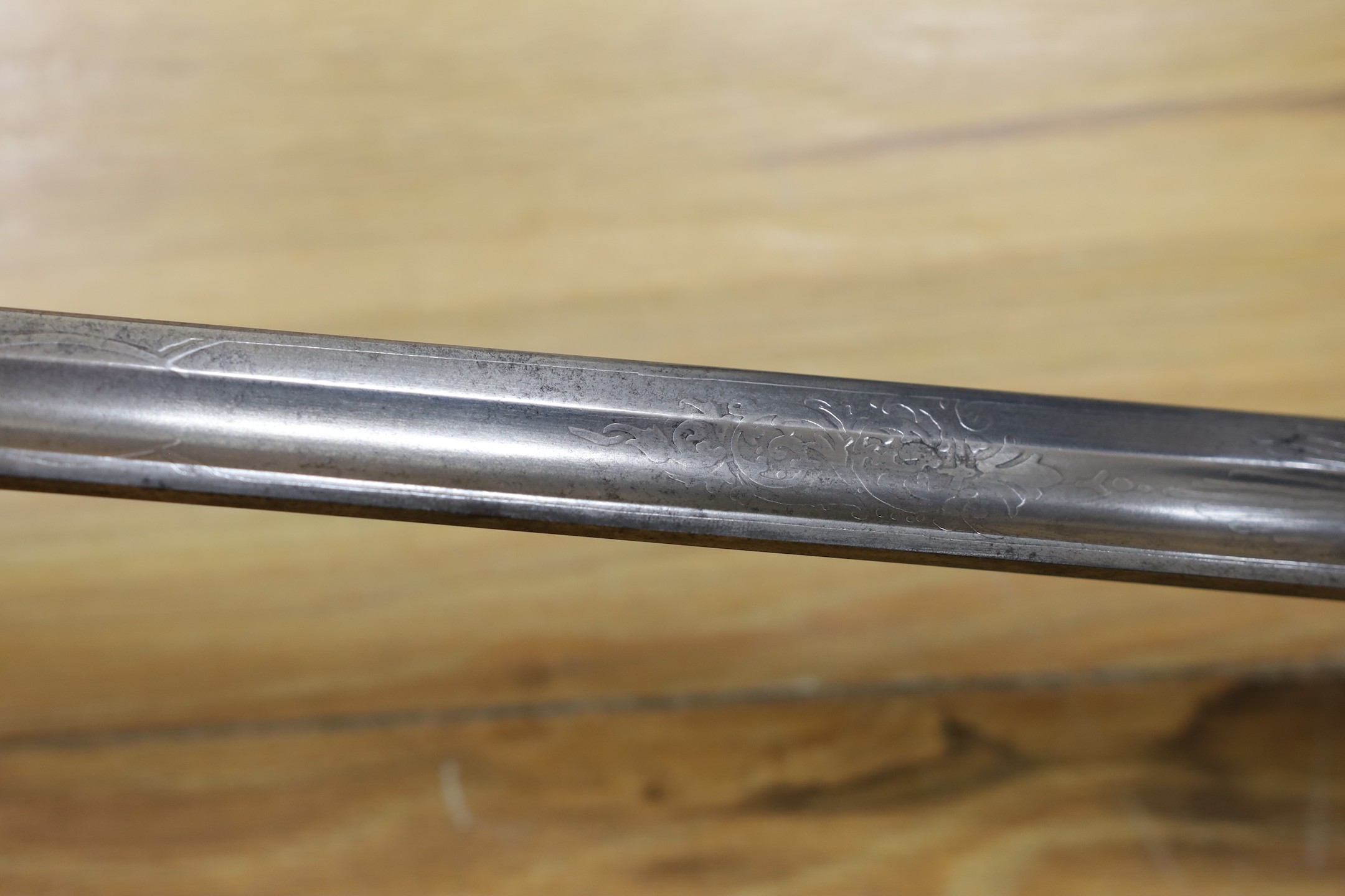 A George V naval officers sword, made by Friedeberg Portsea, serial number 4351 stamped to spine